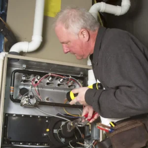 Should a 25-Year-Old Furnace Be Replaced? Learn signs, costs, and safety tips from Hutchinson Heating and Air Conditioning.