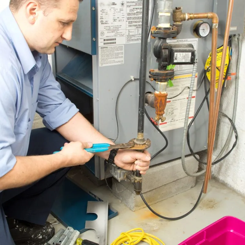 Plumber,Fixing,Gas,Furnace
